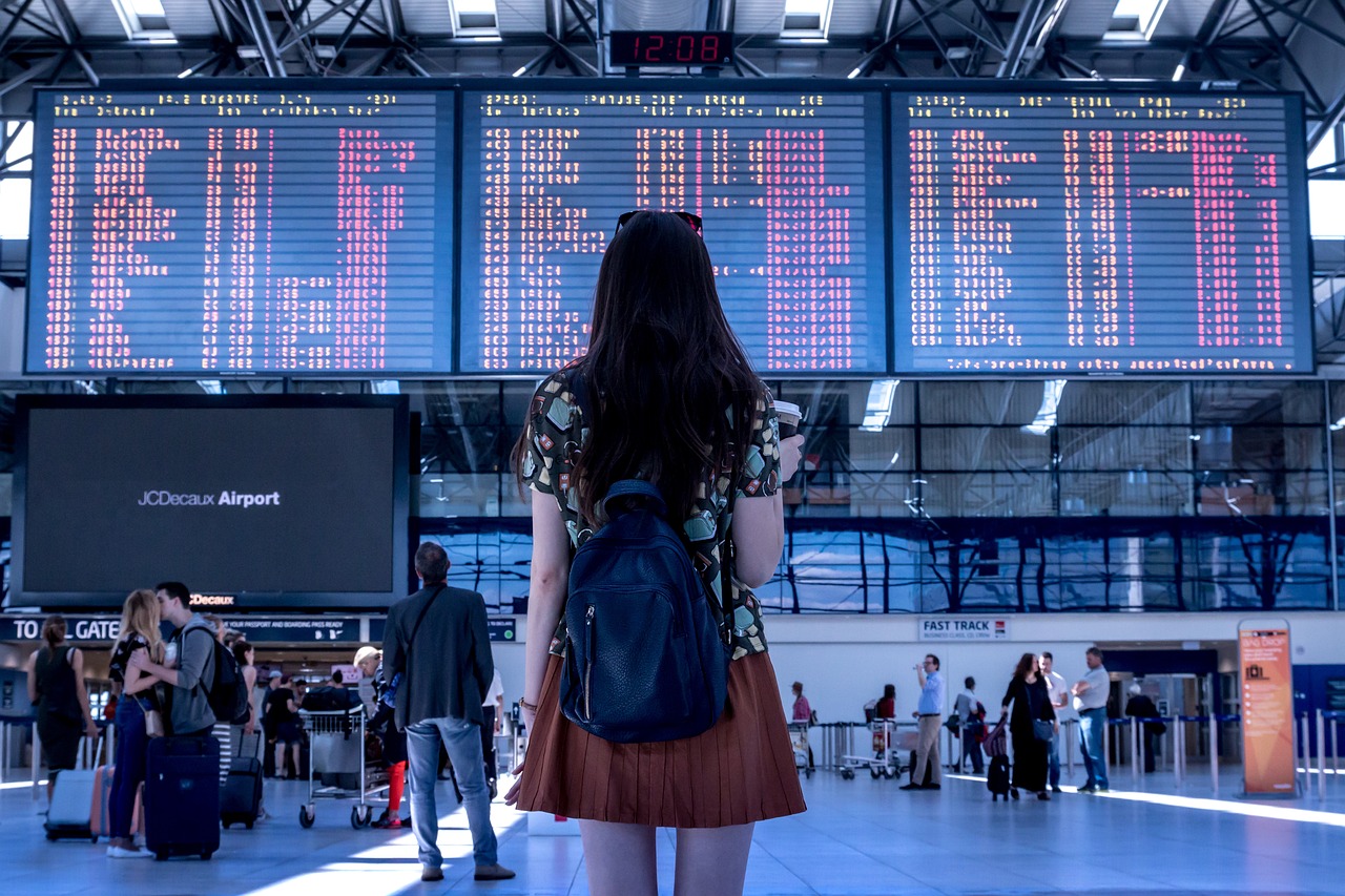 airport woman flight boarding 2373727